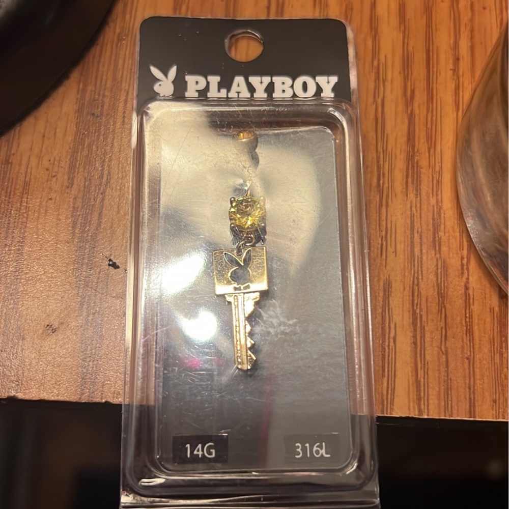 Playboy belly ring from Spencer’s